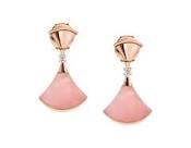 Earring 1: A pair of fashion earrings with pink stones, adding a touch of light and elegance to your look.